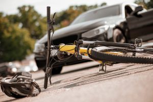Cycling accident claims could be made by injured persons knocked off their bike by a car. 