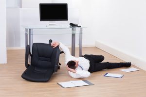 A man suffers office injuries due to a faulty chair. 